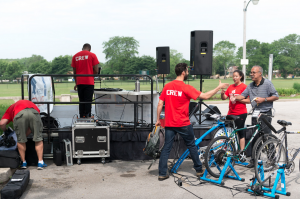 Backstage angle on the set up, with bikes to the right DJ to the left, and speakers in the distance.  © Alston Co. Photo